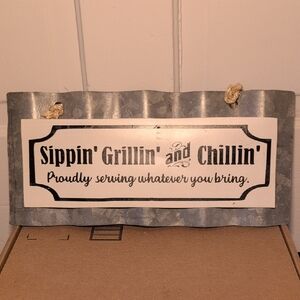 Metallic Grill Sign